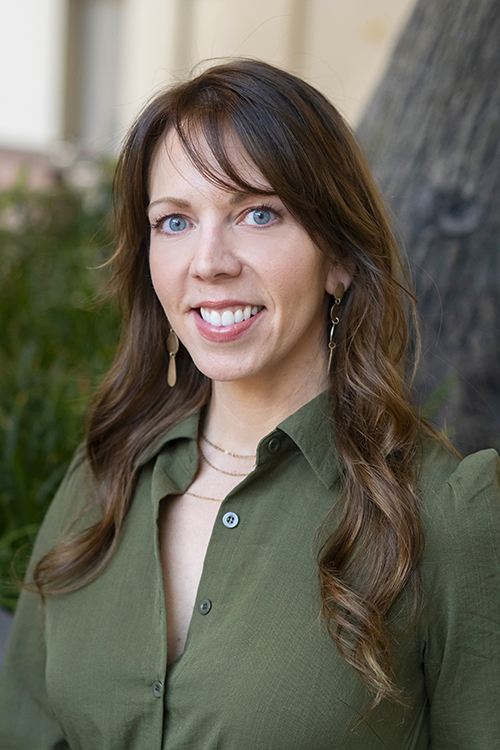 Portrait of Laura Hand, founder of Laura Loo Experience Design